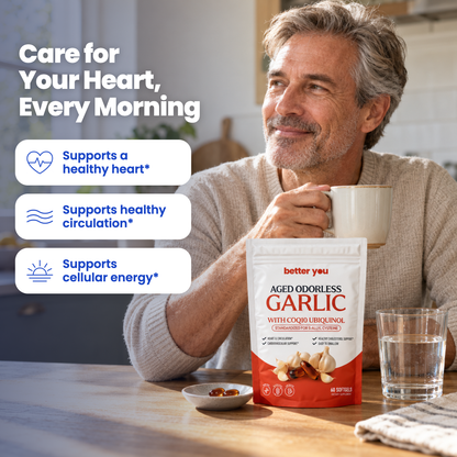 Man enjoying his morning coffee with Better You aged garlic softgels on the table